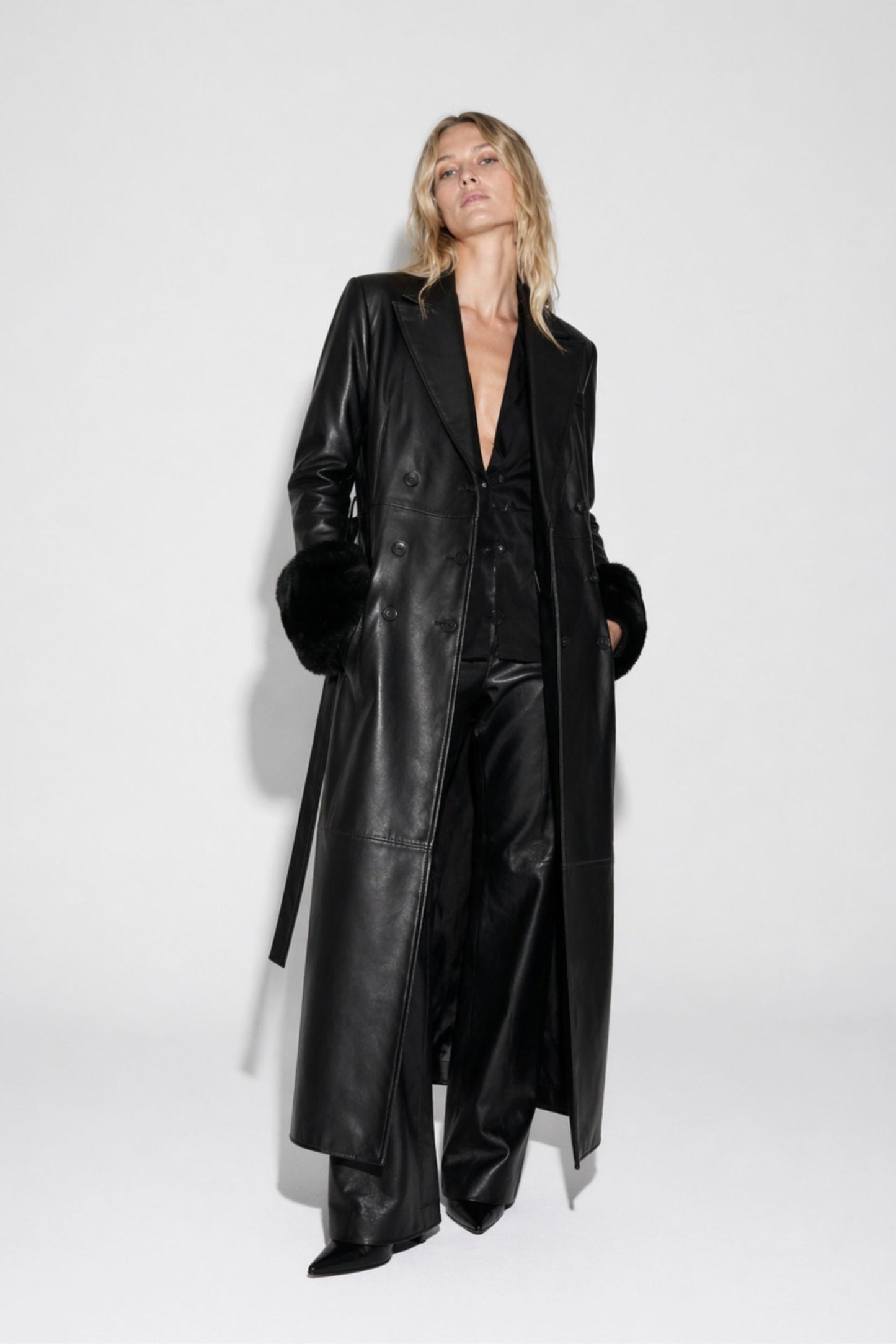 Black leather coat lambswool cuff detail by FRYA Studios